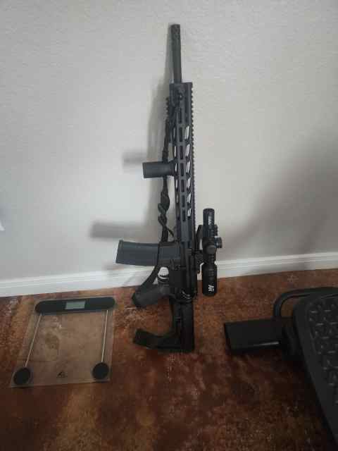 Ruger 5.56 Rifle w/ Cabelas scope and grip