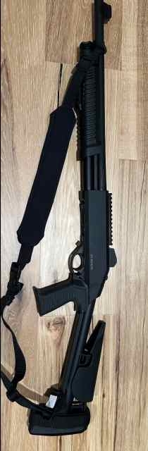 Dickinson tac 4 shotgun with sling