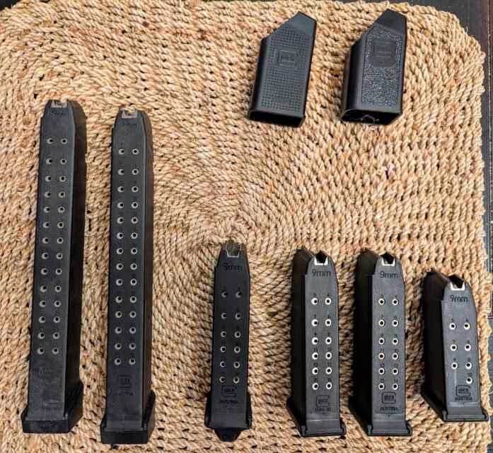 Several OEM Glock 9mm mags