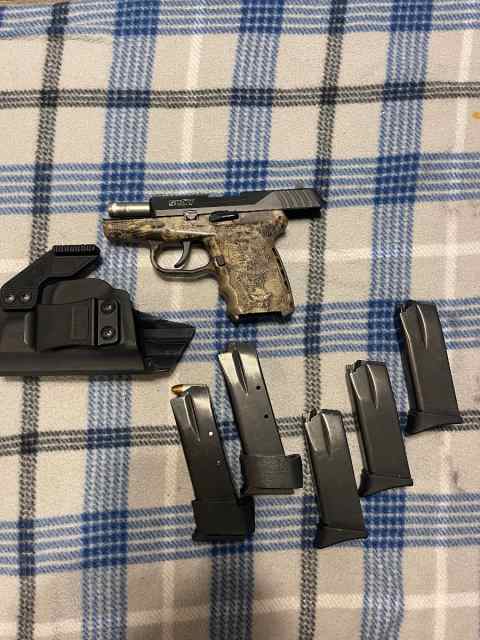 SCCY CPX2 with extended mags/holster
