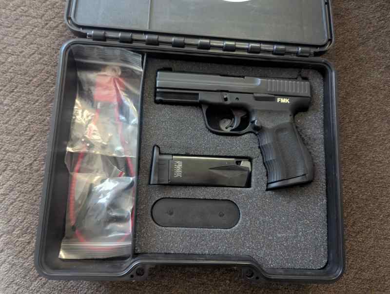 Fmk w/ 2mags and extras 