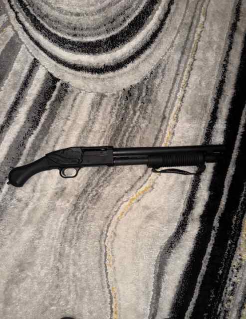 Mossberg 590 shockwave with Crimson laser 