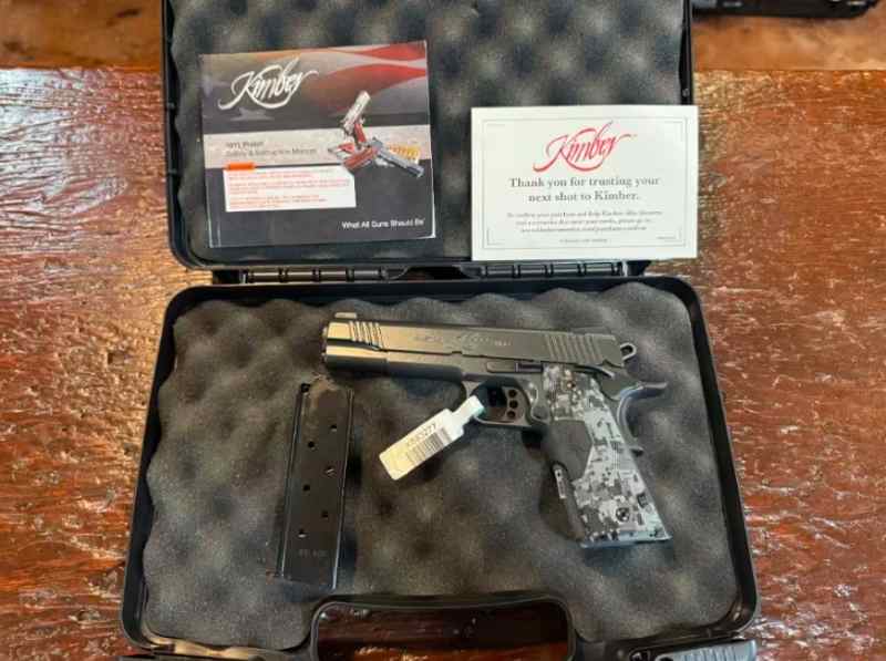 Kimber 1911 Custom Covert w/ crimson trace laser 