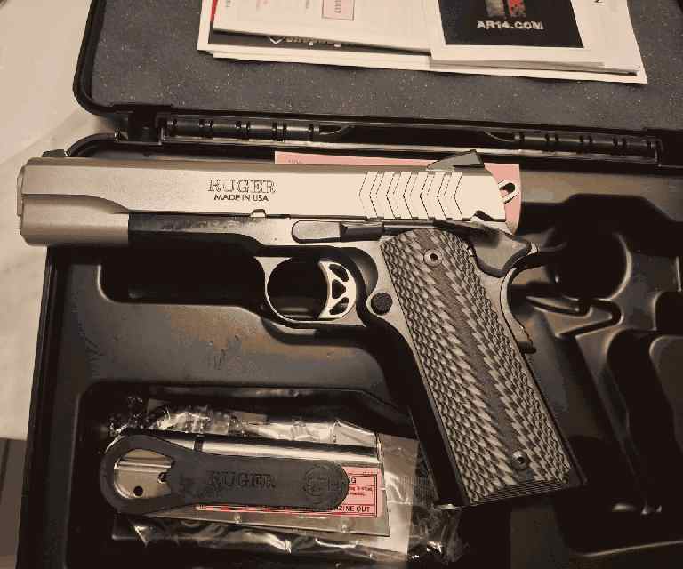 New unfired Ruger SR1911 Stainless 9mm for sale