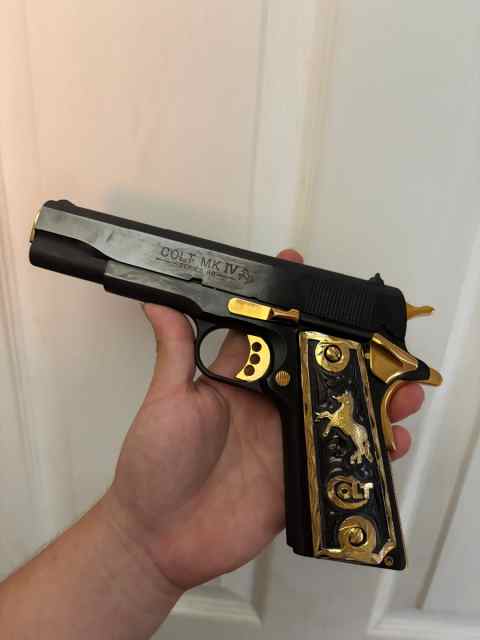Gold and black Colt 1911 80 series 