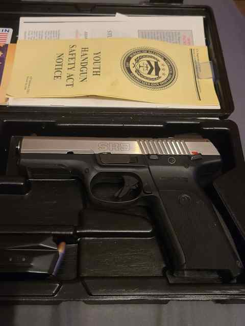 Ruger sr9 9mm, ruger case with extra mag $360