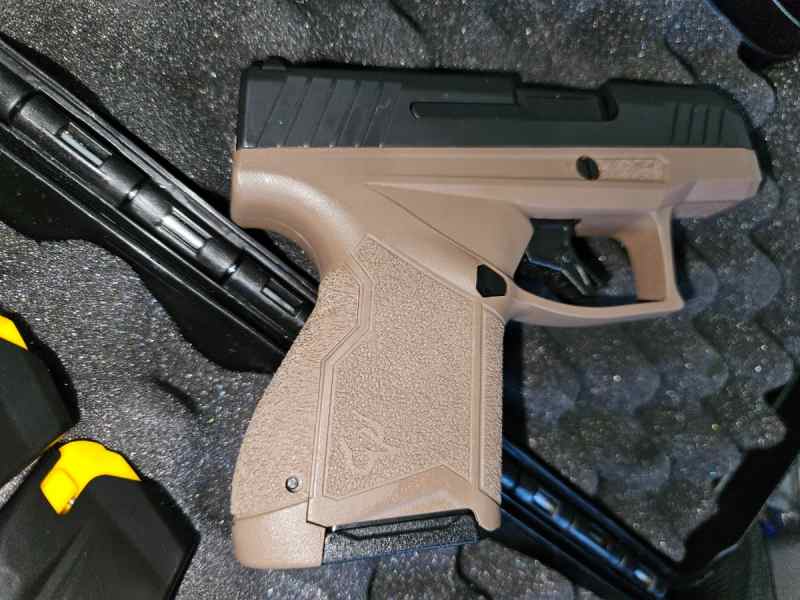 Taurus GX4 Compact w holster mags box 