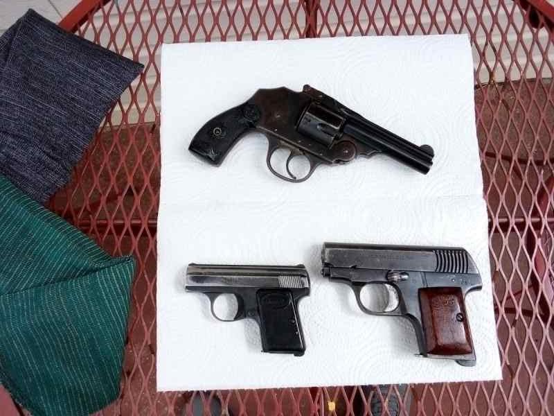 3 antique pistols, $500 cash