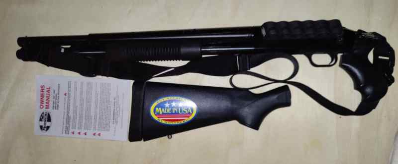 Mossberg 590 plus attachments.