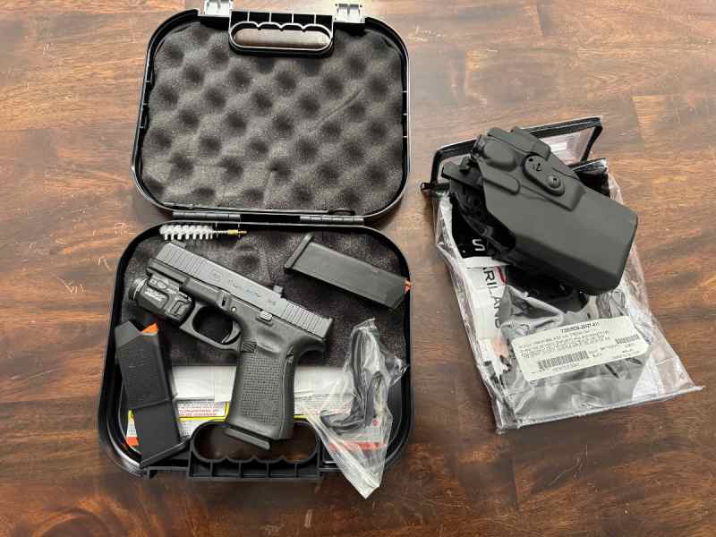 Glock 19 Gen 5 with Aimpoint Acro Jagerwerks cut 