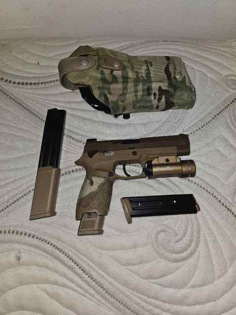 Sig M17 w/ extra 30 rd magazine, tlr-1 light, and 