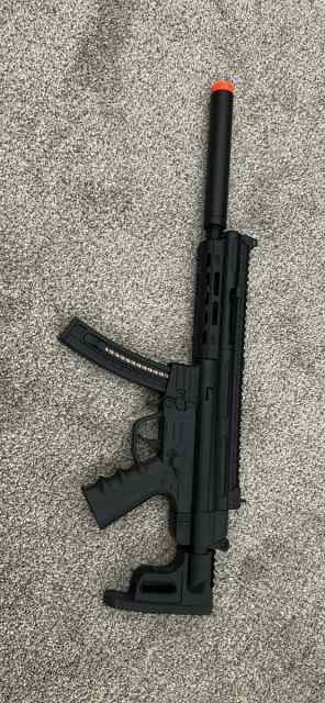 Airsoft AEG SMG with integrated suppressor 