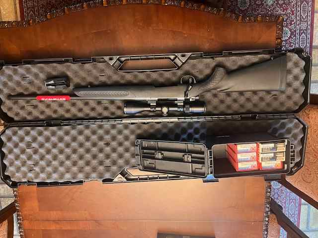 Thompson/Center Compass II w scope, ammo, and case