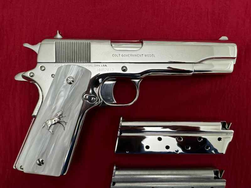  POLISHED COLT 1911 IN BRIGHT STAINLESS, 80 SERIES